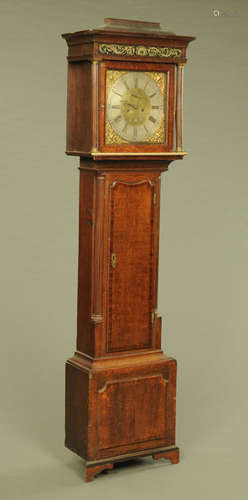 A George III oak and mahogany banded longcase clock,