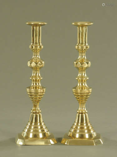 A large pair of Victorian polished brass candlesticks. Heigh...