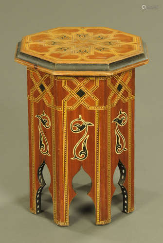 An Islamic octagonal occasional table with painted and inlai...