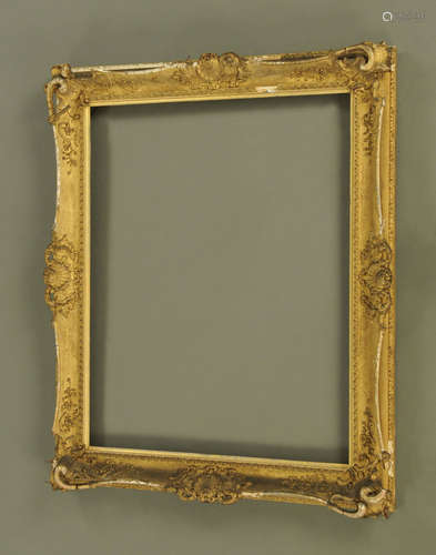 A 19th century gilt moulded and swept picture frame by J.