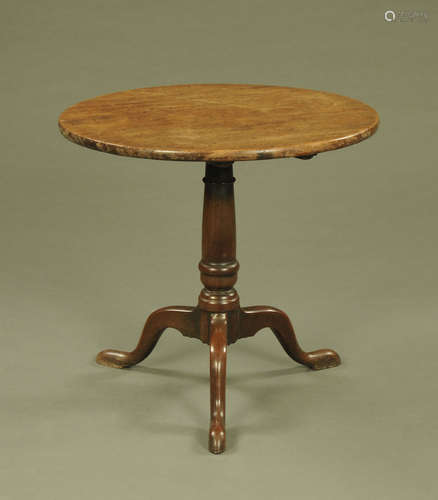 A George III mahogany tripod table, with snap action,