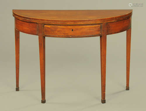 A George III mahogany demi lune tea table,