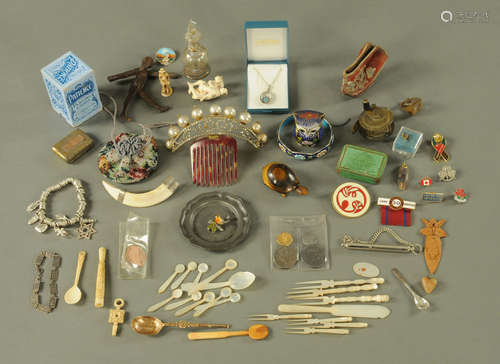 A collection of collectable items including jewellery, reels...