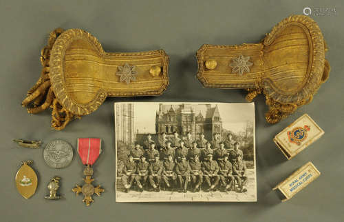 A military O.B.E. together with a pair of Naval epaulettes b...