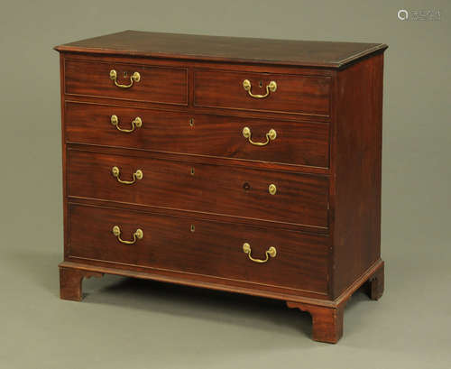 A George III mahogany chest of drawers,