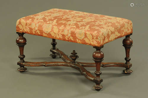 An 18th century walnut stool,