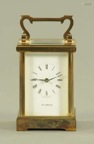 An English brass carriage clock, timepiece only,