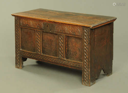 An 18th century oak coffer,