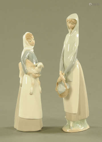 Two Lladro figurines, girl with lamb and girl with basket. T...