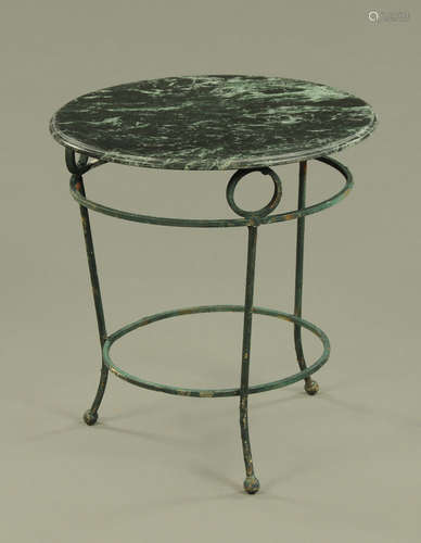 A marble topped conservatory table, with green painted wroug...