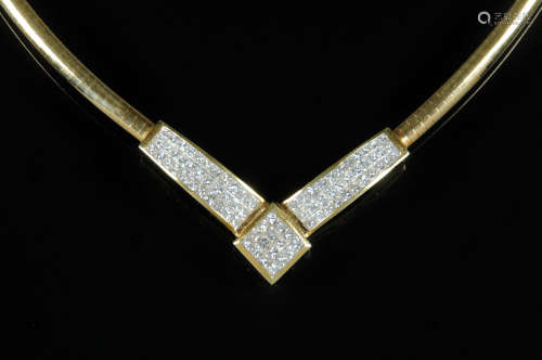 An 18 ct gold diamond set necklace, stamped 18k. 24 grams gr...