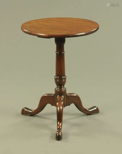 A George III style mahogany tripod table, with fixed top,