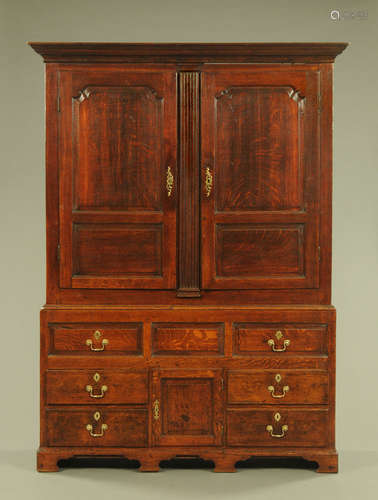 An 18th century oak livery cupboard,