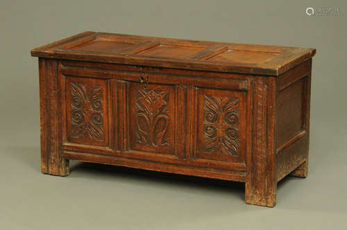 A 17th century and later small oak coffer,