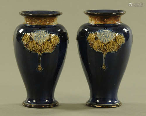 A pair of Royal Doulton blue ground vases in the Art Nouveau...