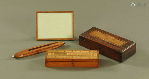 A Victorian walnut cribbage box, containing dice, pegs and p...