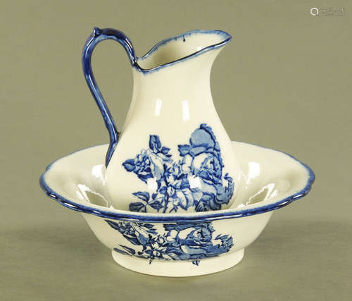 An ironstone blue and white transfer printed toilet jug and ...