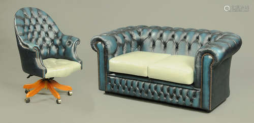 A Victorian style Chesterfield two seater settee with matchi...