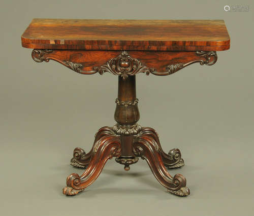 An early Victorian rosewood turnover top card table,