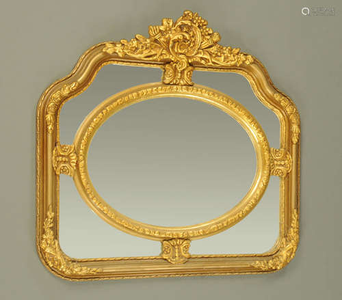 A gilt wood and composition framed mirror,