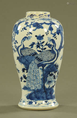 A 19th century Chinese Peacock patterned vase, blue and whit...