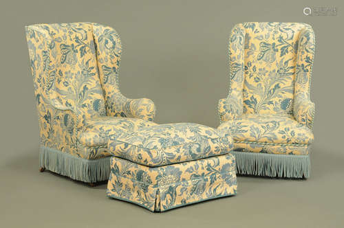 A pair of late Victorian wing easy chairs,