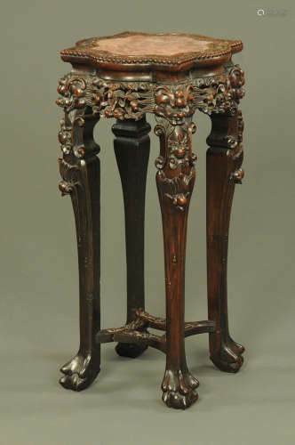 A 19th century Chinese hardwood jardiniere stand,