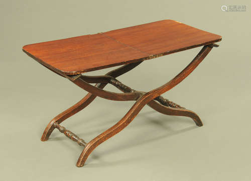 A 19th century mahogany folding low coaching table. Length o...