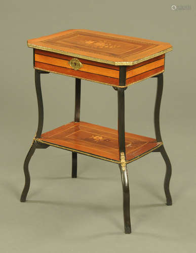 A French foliate marquetry and inlaid lift top worktable, wi...