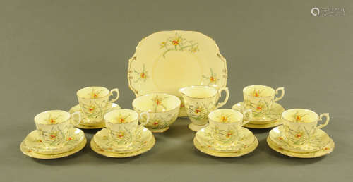 A Crown Staffordshire daffodil patterned half tea set, compr...