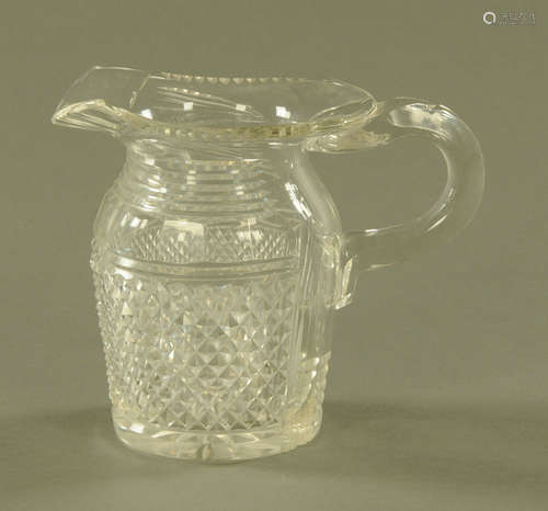 A 19th century hobnail cut glass jug. Height 16 cm.