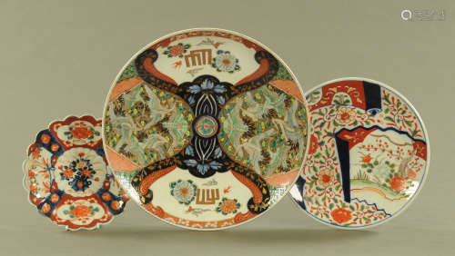 A 19th century Imari charger, decorated with cranes and othe...