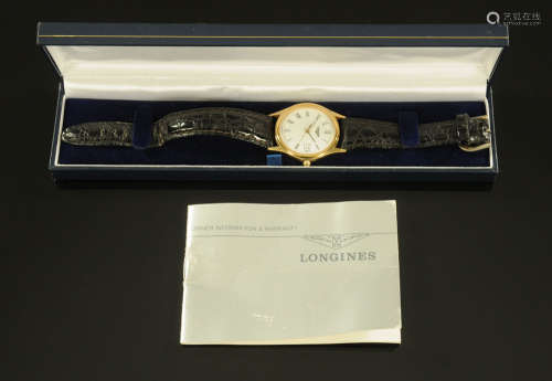 A vintage Longines gentleman's wristwatch, with box and pape...
