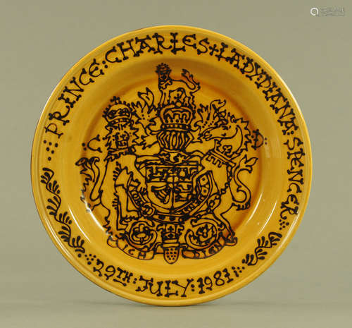 A large Wetheriggs mustard glazed and black slip decorated C...