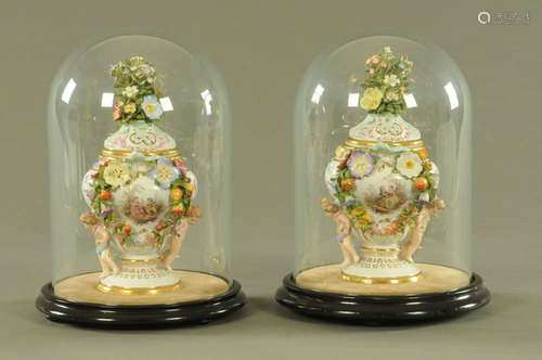 A pair of mid 19th century Meissen floral encrusted porcelai...