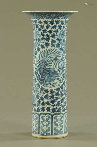 A 19th century Chinese export blue and white cylindrical vas...