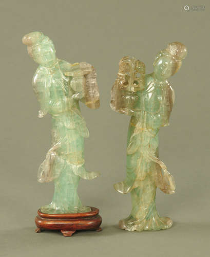 A pair of Chinese carved quartz figures, Guan Yin. Height 30...