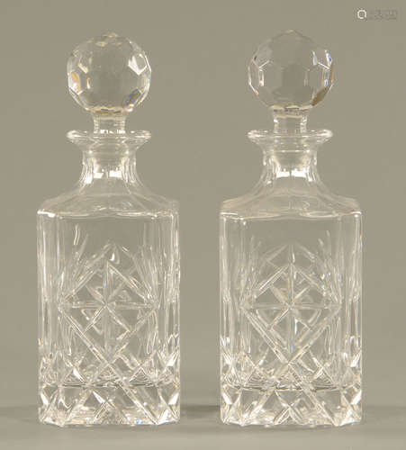 A pair of cut glass spirit decanters, 20th century, each wit...