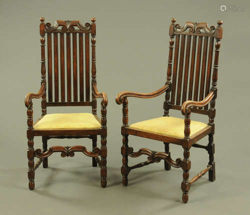 A pair of early 20th century Carolean style oak high back ar...