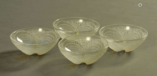 Four Lalique Coquilles small bowls, each etched 