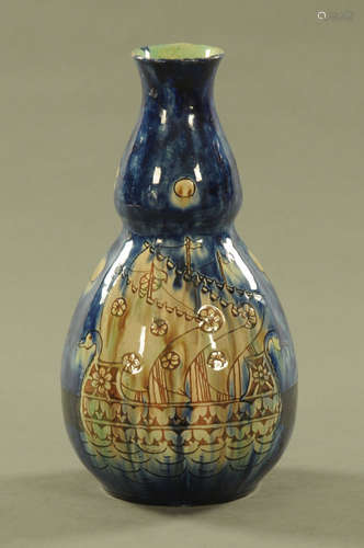 A Della Robbia gourd shaped vase, decorated with ships again...