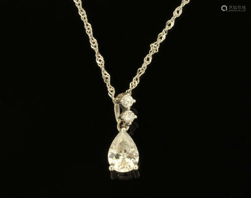 A 9 ct gold pendant, with tear shaped white stone.