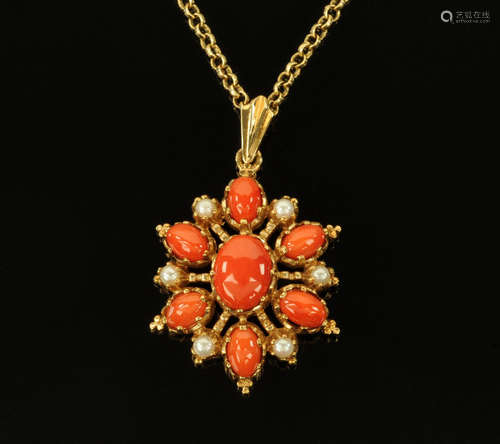 A gold coloured metal coral and seed pearl oval pendant, wit...