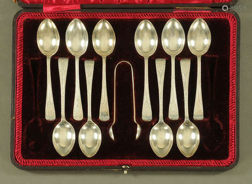 A cased set of ten silver teaspoons and tongs, Sheffield 190...