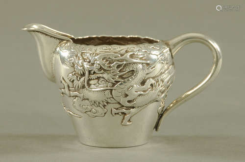 A Japanese silver cream jug,