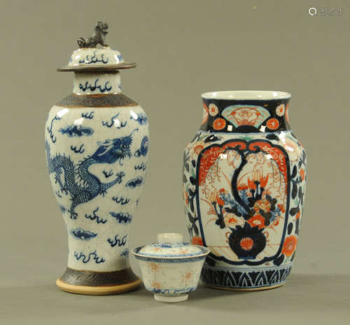 A 19th century Chinese crackle ware vase and cover, decorate...