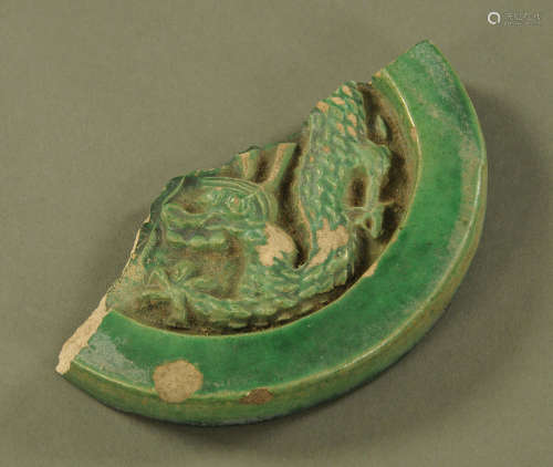 A Chinese antiquity, earthenware green glazed fragment inked...