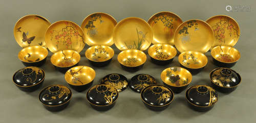 Nine Japanese lacquer rice bowls, and seven ditto plates,