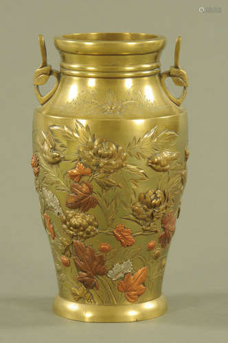 A late 19th century Japanese bronze vase, relief moulded wit...
