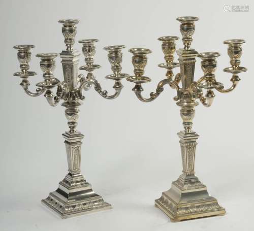 Paire de chandeliers de style Louis XVI en argent 835/1000èm...